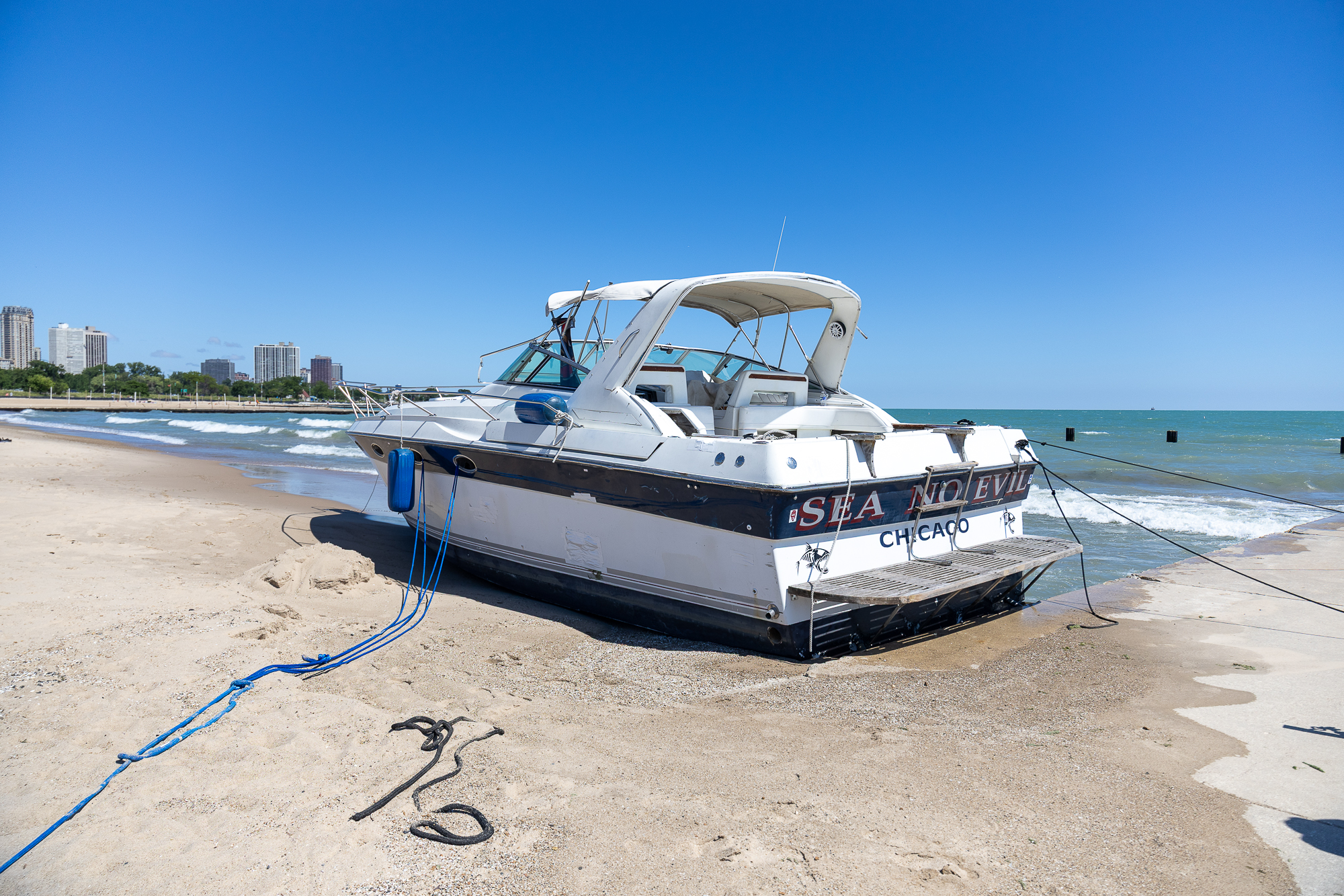 Chicagoans Rally To Help Dislodge Boat Stuck On North Avenue Beach, But It Remains Stuck