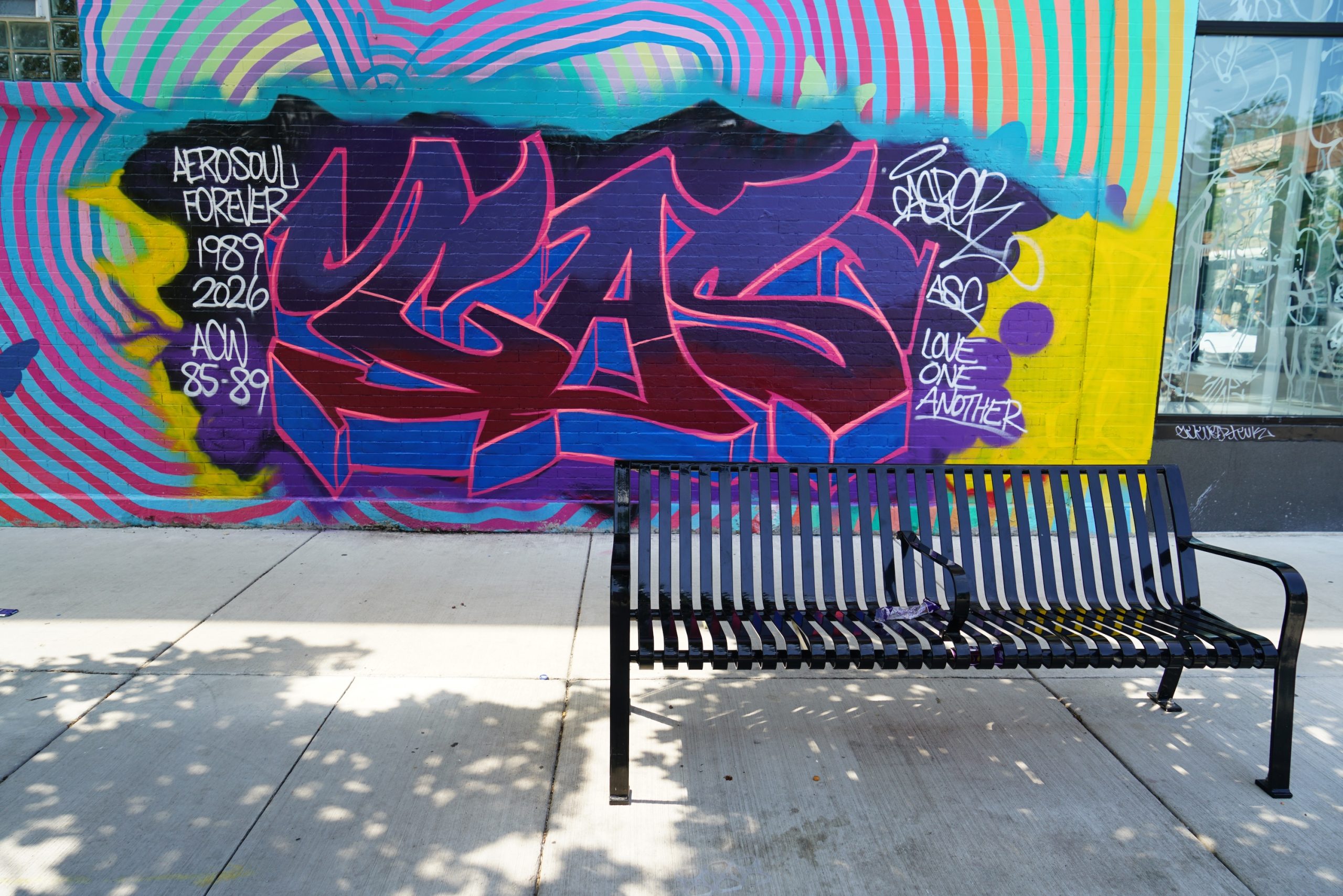 After Taggers Deface Avondale Butterfly Mural, Artist Reclaims It With His Own Graffiti